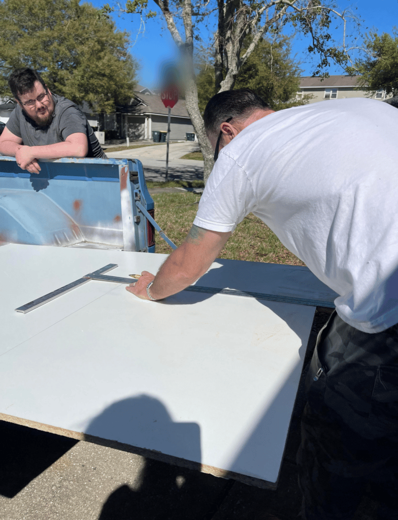 measure the board for the DIY cat birthing box